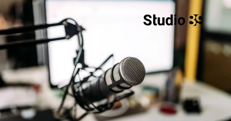 Podcast production Dhaka setup with studio microphone, pop filter, and monitor speaker