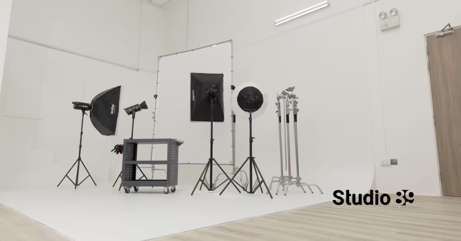 White cyclorama wall with lighting gear at Studio 89, the best studio in Mirpur for professional photography.